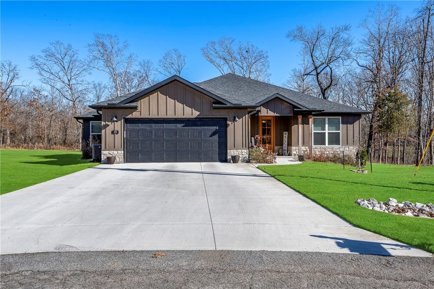 Welcome to this stunning, quality-built home on a rare half-acre lot! Thoughtfully designed, this home offers abundant storage, two entry coat closets & a convenient drop zone. The open-concept layout features a stunning kitchen, huge walk-in pantry, Frigidaire appliances, a built-in oven & gas cooktop. It flows seamlessly into a spacious living & dining area—perfect for entertaining large groups but also cozy enough for everyday use. The living room has a vaulted ceiling and a floor-to-ceiling fireplace. Door & window headers throughout highlight the craftsmanship. The laundry room includes a folding & hanging area. The primary suite offers a gorgeous tiled walk-in shower, double vanities, and a large walk-in closet. The guest bedroom could be an office and has a private bath. Two additional bedrooms share a Jack-and-Jill bath with double sinks and a deep soaking tub. Bonus sprinkler system, covered patio with a TV & sun shades. The patio extends to a sun deck.  3 bdrm septic.  Don't miss out on this opportunity!
