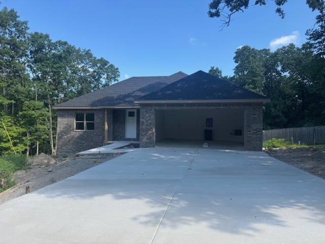 This Brand New Construction 3-bedroom, 2-bath home sits on a quiet street in the Suffolk subdivision. It features an open floor plan with a spacious living room, kitchen with granite countertops and stainless steel appliances, and a dining area that opens to a covered back deck. The primary suite includes a walk-in closet and a private bathroom with a walk-in shower. Outside, there's a large yard, a two-car garage, and plenty of space to relax. Located near walking trails, Lake Ann, and nature spots.