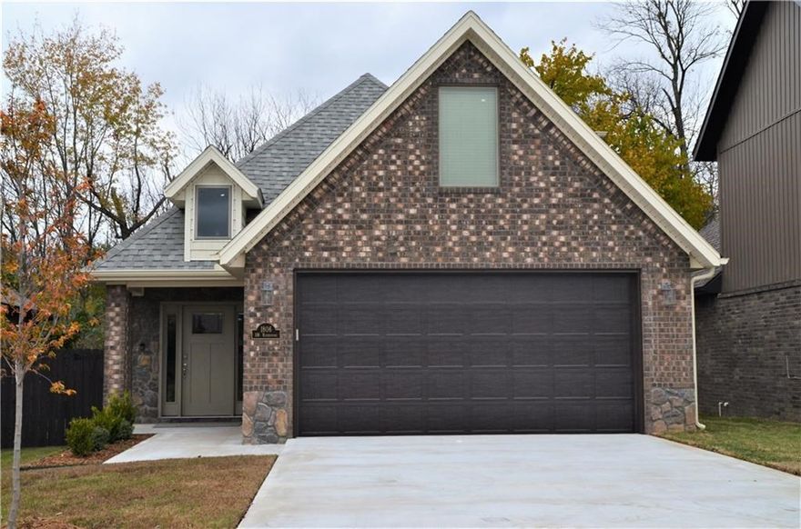 Beautiful home for rent in SW Bentonville. Upgraded features include wood floors, granite counters, custom cabinets, tile backsplash, wall fireplace, high ceilings, pantry, tiled showers, blinds, master on main floor, bonus area on 2nd level, and extra storage. Subdivision includes community pool, club house, and exercise room. Lawn and irrigation provided by POA. Great location close to schools and Walmart home office.