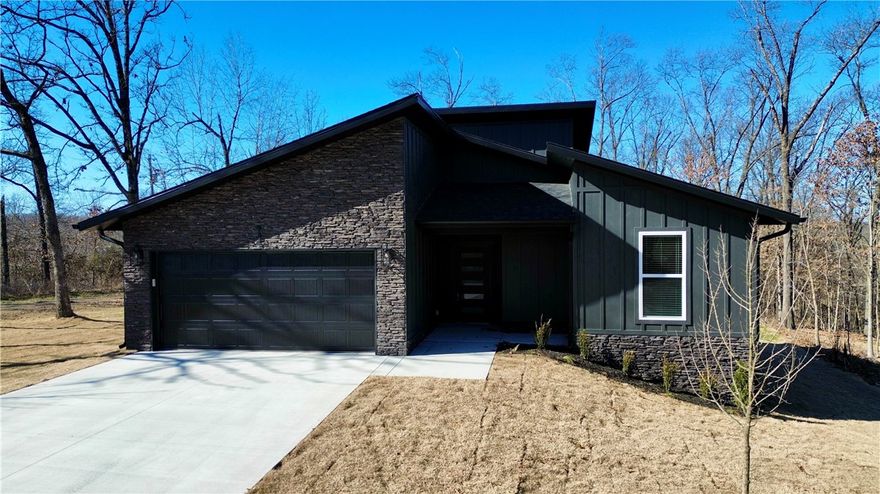 Welcome to this beautifully designed modern home, featuring two spacious bedrooms and a dedicated office/flex room.  The split plan ensures both privacy and comfort, while the sleek, modern exterior adds curb appeal.  The interior is enhanced with custom cabinets, offering both style and functionality.  Relax or entertain on the over sized back deck perfect for all occasions.  This home comes with and extended 10-year warranty as well as $2500 buyer's allowance.