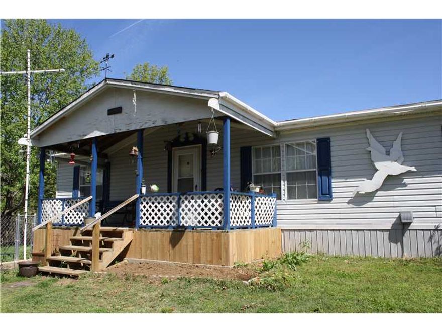 STORM SHELTER! SECLUDED 6.73 ACRES IN THE SONORA SCHOOL DISTRICT. 3 BDRM/ 2 BATH DOUBLE-WIDE MOBILE HOME ATTACHED TO A FOUNDATION (AXLES/HITCHES REMOVED). SPLIT FLOOR PLAN, KITCHEN ISLAND & LRG PANTRY, EAT-IN KITCHEN, LAUNDRY RM. BUILT 1998.,UTILITIES & 2ND SEPTIC ON SITE FOR A SECOND HOME NEAR ROAD SIDE. NEW ROOF 2014. TENANT OCCUPIED. CALL FOR APPT TODAY!