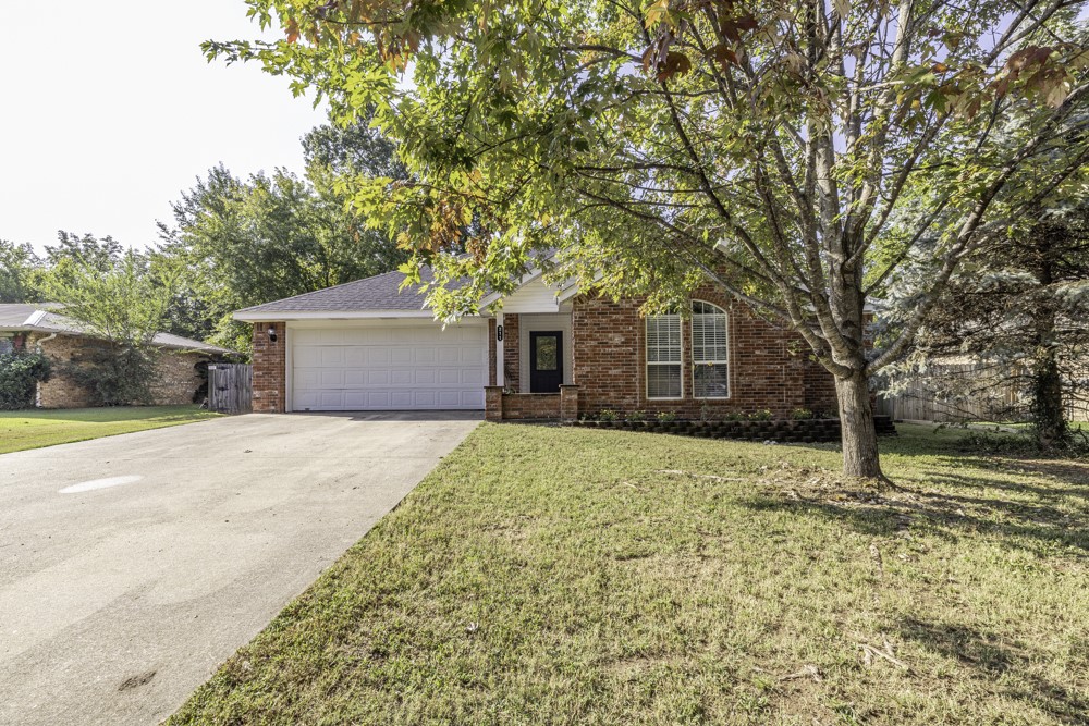 3Br-2Ba-2car brick house built in 2006 with a detached shop in an older established neighborhood fairly close to Praire Grove schools! Roomy master bedroom with ensuite bath. Livingroom has trey ceilings and a gas log fireplace. Crown molding throughout. The Interior has just been professionally painted (walls, ceiling, trim, doors, some cabinets, and garage)! Brand new roof Sept 2023! Lots of brand-new updates that include: appliances, light fixtures/ceiling fans, plumbing fixtures, some flooring, master bath double sink vanity, granite countertops in the kitchen, window coverings, and more! Very efficient heat pump with natural gas backup HVAC system. Brand new concrete back patio just installed for your grilling and relaxing needs! 21 x 21 steel frame shop with concrete floor & 220 electric power! Perfect for storing your toys and using as a workshop. This is truly a great place to call home!
