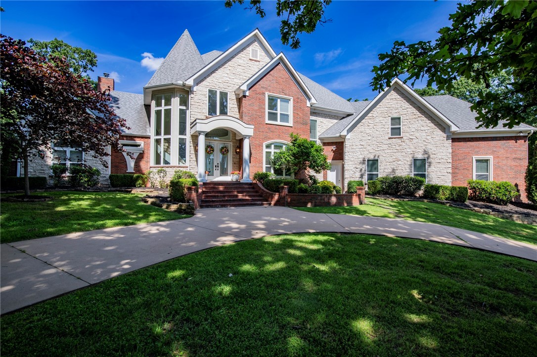 Stunning 5,200+ Sq Ft Estate in Thornbury – Springdale’s Most Prestigious Neighborhood!
This move-in ready 4 bed, 6 bath custom estate sits on a private 1.25-acre lot with a sparkling new heated saltwater pool, surrounded by gorgeous landscaping and no neighbors on one side — plus a serene creek view.Features include a dramatic 20-ft entryway with a grand staircase, a fully equipped home office with custom built-ins, an exercise room, a bonus/media room, a chef’s kitchen with dual ovens and dual dishwashers, wet bar, his and hers walk-in master closets, and fresh updates throughout (new paint, carpet, lighting fixtures). Easy access to the Razorback Greenway walking and bike trails, nearby ballfields, and all the charm and convenience Thornbury is known for.Floor-to-ceiling windows flood the home with natural light, while fine details like crown molding, built-ins galore, and an 882 sq ft oversized garage make this home truly exceptional. Zoned for Hunt, Hellstern, Central, and Harber and just 5 miles to Shiloh!