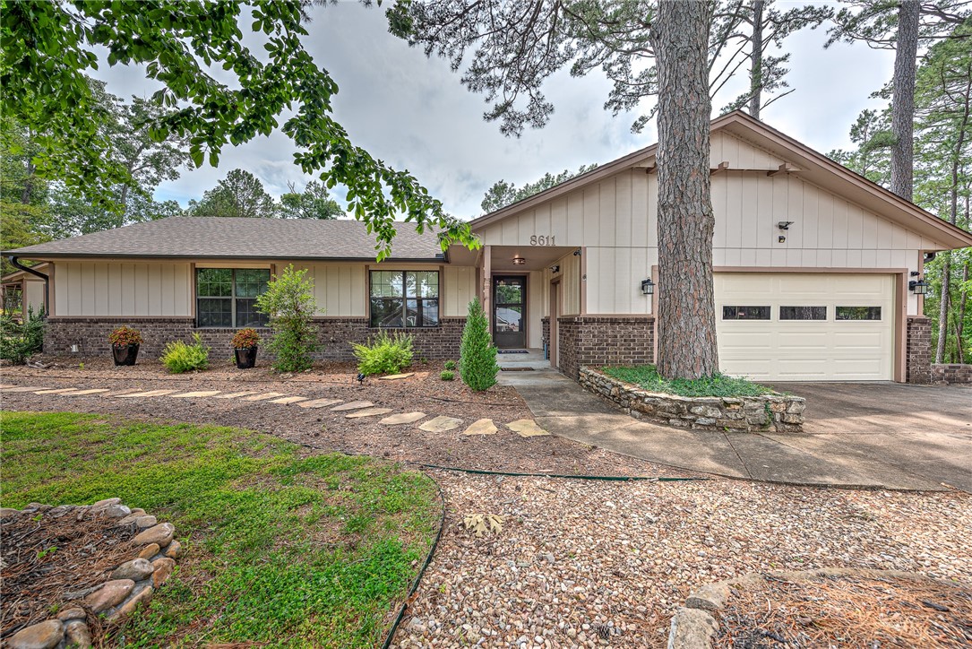Live the lake life you’ve been dreaming of! This charming lake house offers year-round lake views and shared dock access with a private boat slip, lift, and swim platform—perfect for sunny days on the water. Inside, enjoy an open floor plan designed for relaxed living, featuring a woodburning fireplace and beautifully updated maple kitchen cabinets. Two bedrooms and two full baths are located on the main level, with a third bedroom below-great for guests. Step outside to entertain or unwind on the oversized deck, part covered, part open-ideal for grilling or stargazing. The backyard is made for lake evenings with a cozy firepit and room to play. A 364 sq ft heated/cooled bonus building offers flexible space for a lake bunkhouse, remote office, or your own he/she shed. A 160 sq ft storage shed adds even more convenience. Added BONUS-a buildable lot on either side of home! Whether boating, swimming, or just soaking in the views, this home is your gateway to lakeside living at its best. Don’t miss this lakeside gem!