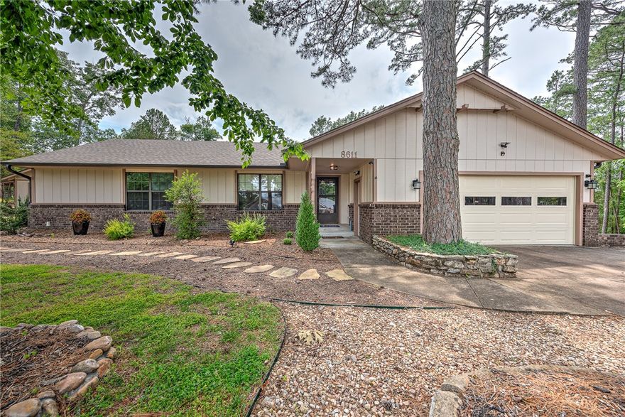 Live the lake life you’ve been dreaming of! This charming lake house offers year-round lake views and shared dock access with a private boat slip, lift, and swim platform—perfect for sunny days on the water. Inside, enjoy an open floor plan designed for relaxed living, featuring a woodburning fireplace and beautifully updated maple kitchen cabinets. Two bedrooms and two full baths are located on the main level, with a third bedroom below-great for guests. Step outside to entertain or unwind on the oversized deck, part covered, part open-ideal for grilling or stargazing. The backyard is made for lake evenings with a cozy firepit and room to play. A 364 sq ft heated/cooled bonus building offers flexible space for a lake bunkhouse, remote office, or your own he/she shed. A 160 sq ft storage shed adds even more convenience. Added BONUS-a buildable lot on either side of home!  Whether boating, swimming, or just soaking in the views, this home is your gateway to lakeside living at its best. Don’t miss this lakeside gem!