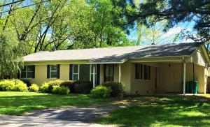 Cute brick starter home! Definitely a must see! Beautiful yard with massive shade trees and landscaping. Original hardwood floors and custom touches in the kitchen and dining. Good-sized living and dining rooms, dedicated laundry, cute kitchen! Storage space in the carport and backyard. **NEW ROOF**