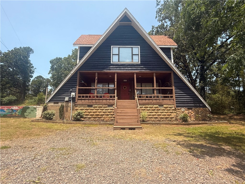 Charming and unique AIRBNB on Skyline Drive- Turnkey Invesment Opportunity! Welcome to this beautifully updated, fully furnished 3 bedroom and 2.5 bath Airbnb nestled on 0.75 acres. Bursting with character and charm, this property features a cozy front covered porch and a back patio- perfect for relaxing or entertaining. Inside you will find a clean, fresh, and thoughtfully updated space that is ready for it's new owner to step right in and start earning. The home offers a peaceful, nature- inspired setting that feels tucked away but only minutes from town. Whether you are looking for a personal retreat, a short term rental invesment, or both- this is a rare find that checks all the boxes.