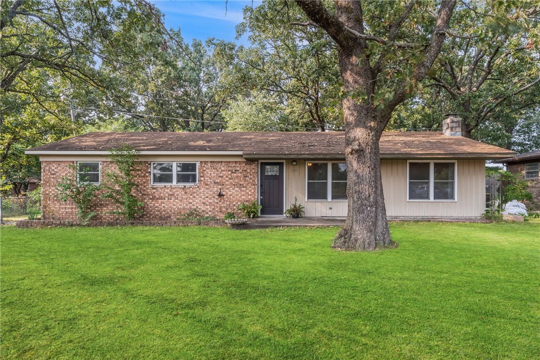 Quaint ranch-style home in Decatur with 1,463 square feet on a .24-acre lot. The front porch introduces the single-level layout, where open living spaces connect seamlessly for easy everyday living. The kitchen includes an updated dishwasher, while three bedrooms and one and a half baths offer comfortable function. A fenced yard enhances outdoor enjoyment, with room for pets or play. With classic charm, practical updates, and the ease of ranch design, this home balances affordability and small-town appeal just minutes from Northwest Arkansas conveniences.