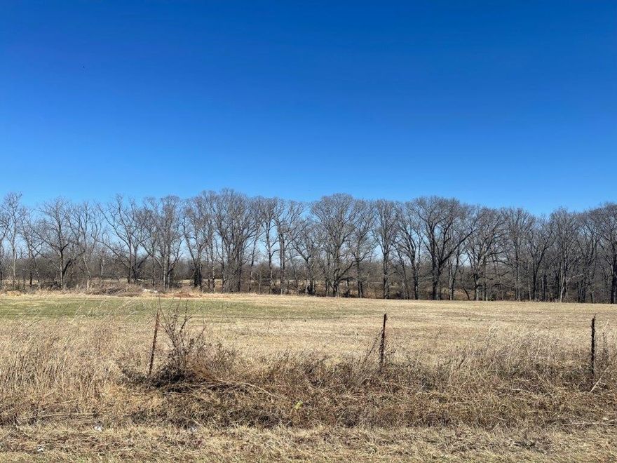 35.36(+/-) acres. Lots of possibilities! Open space, some trees, can be used for single home or possible development. Easy access to downtown Rogers but, still have that country feel.