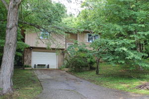 Private setting. Quiet end of street. 2Bd/1Ba with office/study and a den with a gas fireplace. A great place for family and friends to gather in winter and a covered patio with a deck for grilling in the summer. New windows installed in 2014 with transferable lifetime guarantee.