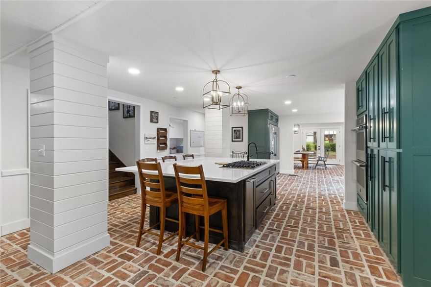 A stunning 6-bedroom, 5 full bath, 2 half bath residence boasting a generous 6,900 sqft of sophisticated living space. Recently renovated to enhance its charm and functionality, this property is a blend of luxury and practicality.
The heart of the home features two elegant fireplaces that offer cozy ambiance and warmth during the cooler months. Chefs and culinary enthusiasts will delight in the high-end appliances and ample preparation spaces.
A dedicated theater room and workout room add a touch of luxury and convenience, ensuring entertainment and fitness are just steps away. 
Car enthusiasts or those needing extra storage will appreciate the expansive 4-car garage with a built-in workshop and a 50-amp RV hookup.
Outdoors, the property impresses with significant lot size and meticulously cared for spaces, ideal for relaxation or hosting outdoor events.
This house is not just a home; it's a lifestyle waiting to be embraced by those who appreciate fine living in a superb location.