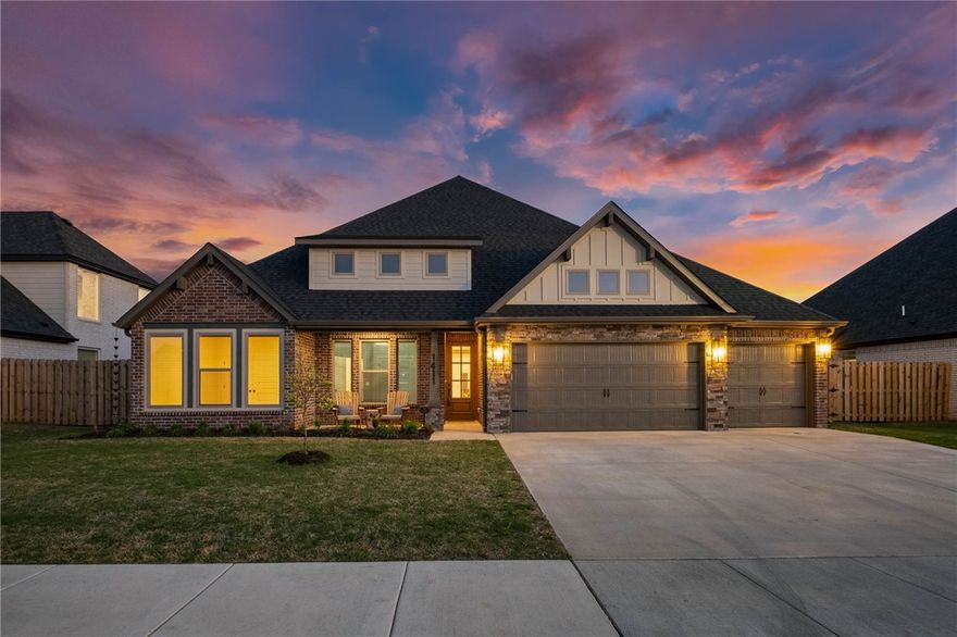 If you’ve been waiting for something that truly stands apart from the rest, this is it. Completed in 2025, this 4-bedroom, 2.5-bath home with a formal dining space is an absolute showstopper. From the moment you step inside, you’ll notice the difference, custom imported backsplash and hardware, ceiling-height cabinetry, curated lighting, accent walls, and wallpapered bathrooms that add depth and personality throughout. Every detail was considered, from soft-close cabinetry and a pot filler to custom-built pantry and primary closet. The GE Cafe appliance suite, including double ovens, dishwasher, and refrigerator, is included. Engineered wood flooring flows seamlessly through the home, leading to a spacious covered patio with a gas fireplace, perfect for quiet evenings or hosting guests. Located just minutes from Bentonville and Centerton, and within walking distance to Bentonville West High School, this home also offers access to a neighborhood clubhouse and pool. Homes like this one don’t come around often!