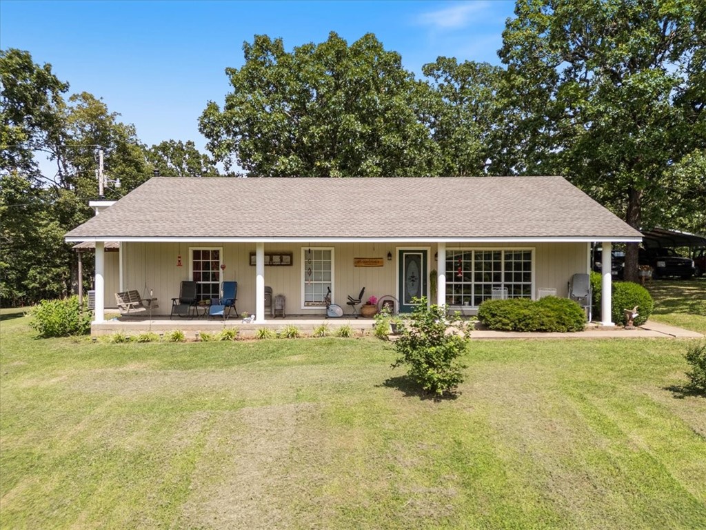 Peaceful Retreat on 6.3 Acres with Workshop & Bonus Features
Discover this meticulously maintained, one-owner home set on 6.3 serene, park-like acresāperfect for nature lovers and those seeking privacy. Only 25 minutes from U of A Campus. Relax on the charming front porch while soaking in sweeping views and watching deer, foxes, and squirrels roam the landscape.
Inside, youāll find a cozy bonus room complete with a wood-burning stove and hot tub, offering a warm and relaxing space year-round. A spacious concrete floor workshop on the property provides the ideal setup for hobbies, projects, or extra storage. Quaint sun tent to enjoy outdoor mornings or evenings.
This home is connected to public water but also includes a private 300ā deep wellāperfect for gardening or landscaping. Major upgrades include a new roof in 2024 & a high-efficiency HVAC heat pump 2022 paired with an inline wood-burning furnace for added comfort and energy savings.
A rare opportunity to enjoy peaceful country living ādonāt miss it!