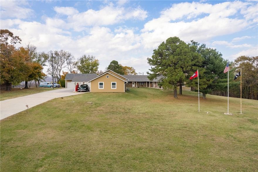 Gorgeous Mountain views from this Unique custom built home with 2 separate units that consist of a 2 bd. 1 bath & kitchenette, a 3 bd. 1 bath & kitchenette that were used as an Airbnb. The garage/office/shop building offers 1824 sq. ft. of a 20x24 office with 1/2 bath & coffee bar. & a 28x48 area shop/car storage with two 9x7 OH doors & two 9x8 OH doors. Seller rented the units during Bikes & Blue steel Rally, Razorback games, during summer to Lake Ft. Smith season. Would work for large family or in-law quarters or monthly rentals. Boarders the National Forest, Central vac for all. Full basement Storm cellar & storage, mechanical area. 1250 gal. septic tank.