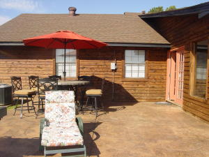 COUNTRY SETTING 4 BR 3 BA country and rustic style ranch home sitting on almost 5 acres. Come see all the new updates including kitchen, flooring, and bathrooms. Enjoy the afternoon sitting on the stained concrete back patio or take in a full cup of coffee in the heated and cooled sunroom attached to the back of the house. The home has all the features you will be looking for in the country
