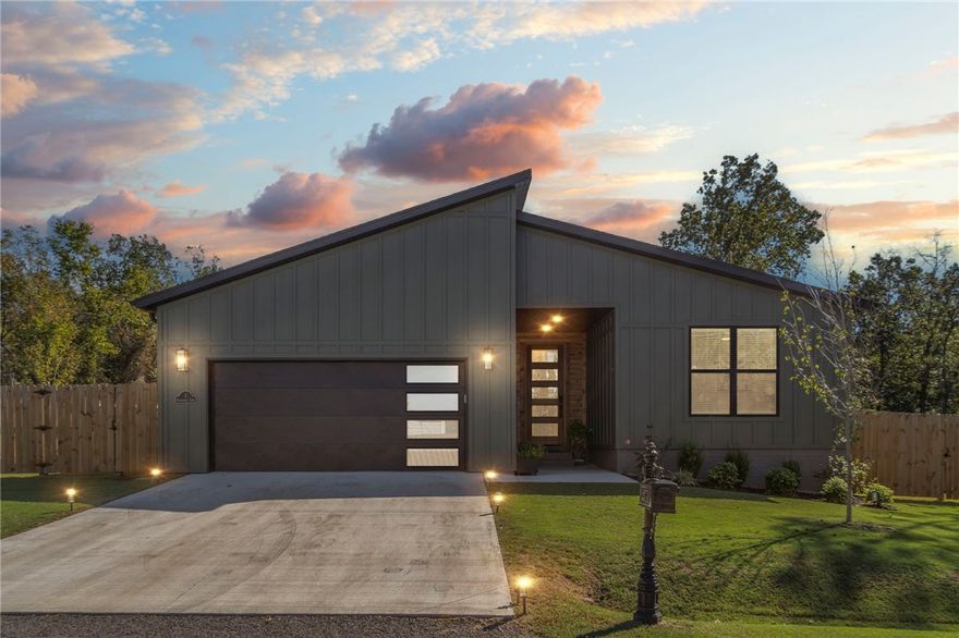 Modern style and move-in ready! This stunning 1-year-old home offers 2 bedrooms, 2 baths, and a flexible third room perfect for an office, guest space or third bedroom (home is on a 2-bedroom septic). The modern open layout features a split floor plan for added privacy, sleek finishes, and abundant natural light. Step outside to enjoy the extended covered patio—ideal for morning coffee, entertaining friends, or simply relaxing outdoors. The large, fenced, flat backyard provides space for play, gardening, or pets to roam freely. Located just ½ mile from beautiful Lake Loch Lomond and close to Branchwood Activity Center, where you can enjoy tennis, walking trails, fitness facilities, a pool, and more! This home combines modern comfort, outdoor living, and unbeatable location in one stylish package! Welcome to Bella Vista lifestyle!