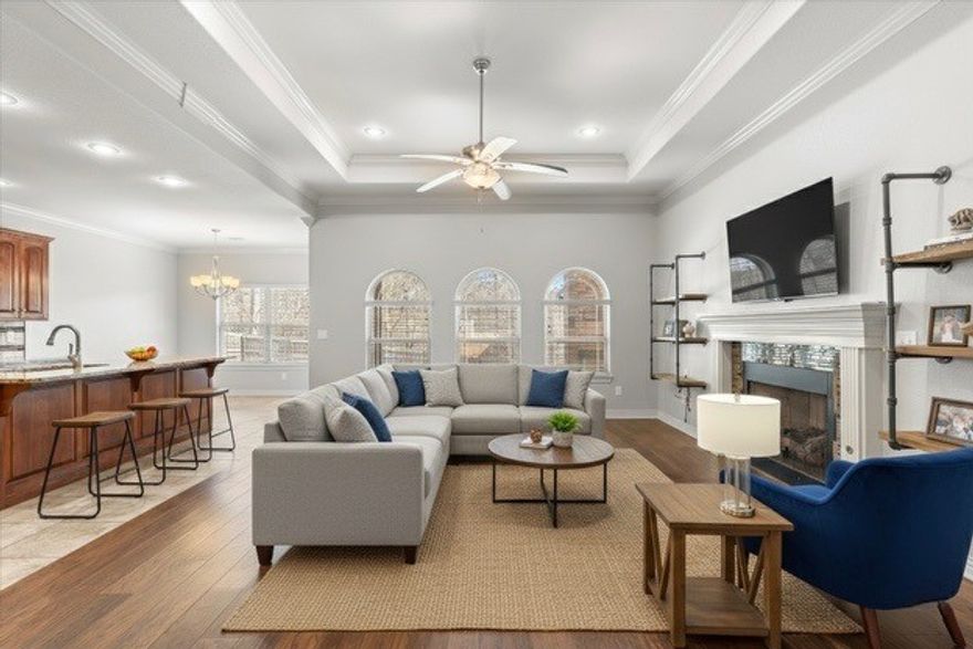 Welcome to this stunning 4-bedroom, 2-bath home, zoned for the top rated Bentonville Schools. With an expansive open-concept floor plan, the heart of the home is a chef-inspired kitchen featuring a massive social island, premium appliances (including a 2021 dishwasher), and an oversized walk-in pantry with storage capacity that truly impresses. The interior shines with brand-new carpet (2026) and a fresh, neutral palette throughout. Major high-ticket updates provide ultimate peace of mind, including fully replaced ductwork (2025) for peak HVAC efficiency and climate control. A versatile bonus room offers the perfect footprint for a dedicated home office, gym, or game/playroom. Whether hosting summer BBQs or enjoying a quiet evening, the covered patio and outdoor fireplace create a serene year-round retreat. Situated in a prime location with professional landscaping and a floored attic for maximum storage, this home is perfect!