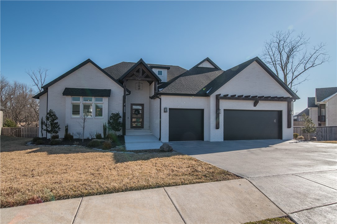 This home is just what you've been waiting for! Gourmet kitchen with large quartz island, custom cabinetry, commercial-style fridge, 5 burner gas range, double ovens and large pantry. Laundry rooms on both levels. Living, dining, office, half bath and master suite on main level. Walkout basement has large bonus/game room, three bedrooms, two full baths and a second laundry room. 2 covered outdoor spaces can be accessed upstairs and down. Awesome fire pit in the back yard that makes for a great gathering spot. Highly sought after Oak Tree community offers resort style pool, tennis, fitness center, playground and clubhouse. Don't miss out in this opportunity to enjoy all this home has to offer.
