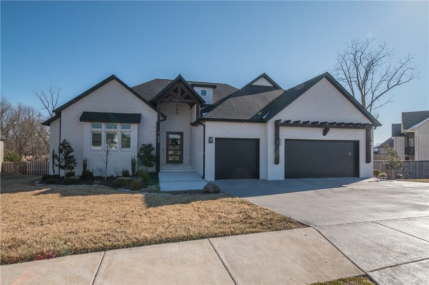 This home is just what you've been waiting for! Gourmet kitchen with large quartz island, custom cabinetry, commercial-style fridge, 5 burner gas range, double ovens and large pantry. Laundry rooms on both levels. Living, dining, office, half bath and master suite on main level. Walkout basement has large bonus/game room, three bedrooms, two full baths and a second laundry room. 2 covered outdoor spaces can be accessed upstairs and down. Awesome fire pit in the back yard that makes for a great gathering spot.  Highly sought after Oak Tree community offers resort style pool, tennis, fitness center, playground and clubhouse.  Don't miss out in this opportunity to enjoy all this home has to offer.