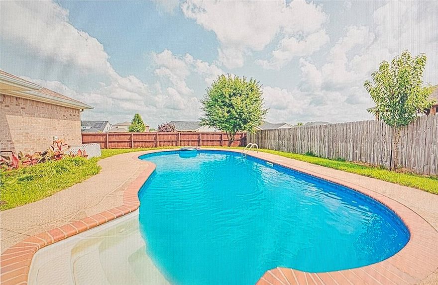 3 Bedroom 2 bath home all brick home sits on a corner in the WindWood subdivision. Nice fenced in backyard with an in-ground Vinyl pool and a 100 sq ft storage building. Comes with a split floor plan, corner fireplace, new stainless steel appliances in the kitchen, Eat in Kitchen and a separate formal dining room. Recent updates; HVAC 2022, Pool vacuum & mesh cover 2022, Landscaping Front & Rear, Garbage disposal 2023, blinds in master bedroom & bay window, wi-fi garage opener, Rain shower in Master shower, smart thermostat and much more.