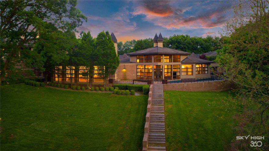 Newly updated home located in the gated Beau Chene Farms subdivision, this extraordinary contemporary estate affords a life without compromise, a place where grand entertaining, ultimate privacy, and convenience are paramount. Tucked back on 8.45 private wooded acres and offering 9,943 sq. ft. of living space organized on two levels. Brilliant modern architecture is on full display in the home of walls of windows, which affords 3 spacious bedrooms, study, library, a fireside living space, open entertainment spaces with expansive views of the property, a luxurious swimming pool, spa, and separate 4-car carriage house with an apartment suite that serves as the 4th bedroom. The master suite is privately positioned with separate his and her bathrooms, exquisite designer closets, and exercise room.