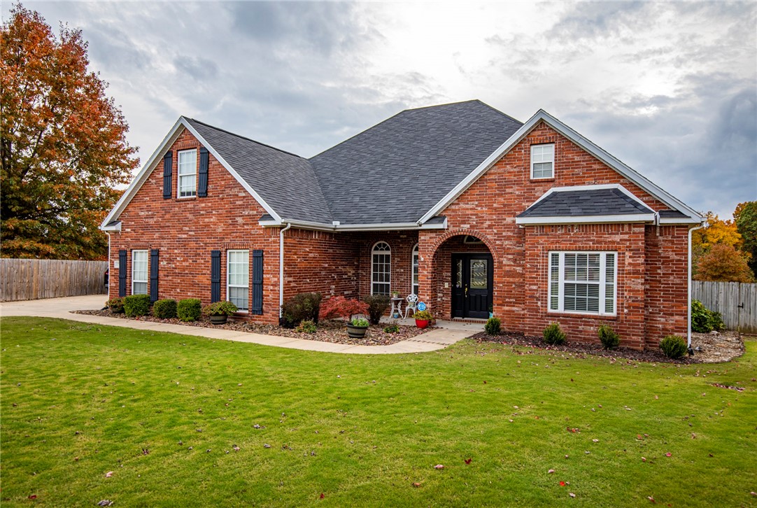Beautiful, well-cared for brick home on a quiet cul-de-sac with a massive fenced-in backyard close to the Razorback Greenway! Great split floor plan with hardwood floors and lots of natural light. New roof in 2019. This home even has a tornado shelter built into the garage slab. Great partially covered wood deck for entertaining all year long, gas log fireplace, ecobee smart thermostat, and large bonus room centrally located off the kitchen. This home has function, elegance, and comfort all in a super convenient location in the middle of Northwest Arkansas!