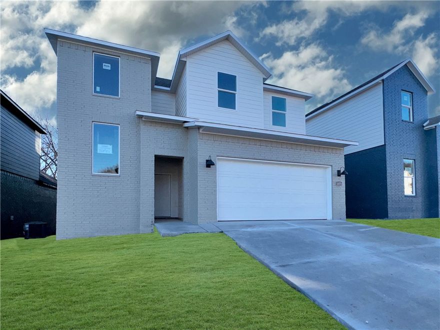 The Lovely Pierce plan in Pine Hollow! This community offers two story homes with spacious living areas, perfect for entertaining and everyday comfortable living. This home features 4 bedrooms, 3.5 baths, and a game room upstairs! You’ll enjoy a beautiful modern electric fireplace with a poplar mantle in the living room!  Full oak Tread Staircase with black modern handrails-Bathroom 1 will be tile flooring- Beautiful Wood Laminate click LVP first and second floor! In the kitchen, you’ll find stunning quartz countertops, tile backsplash, and a gas range. The primary bedroom has an ensuite complete with quartz countertops, dual sinks, freestanding tub, a walk-in shower with tiled walls!  The living room, each bedroom, and game room will have a fan. Home exterior features painted brick and Hardie® siding  (per plan).  Covered patio (per plan). The programmable thermostat allows you to effortlessly control your environment with the touch of a button! Taxes and parcel TBD.