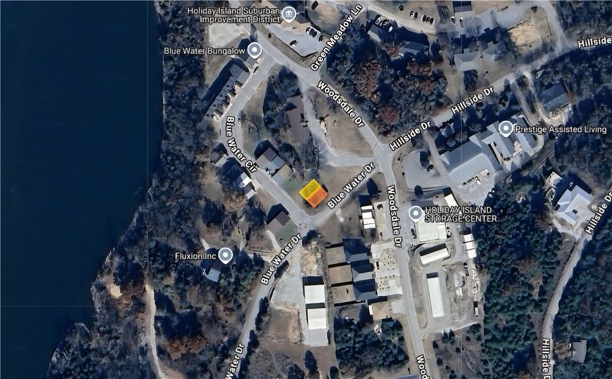 Time to add a small business that is close to the water on Table Rock Lake of Holiday Island in Carroll County! This corner commercial property is 2 parcels that equal a .06 (+/-) lot which is flat and cleared with a few trees. It is close to other local amenities and only minutes from Eureka Springs. Owner financing is available. Property conveys a Limited Warranty Deed. Call or text for more information.