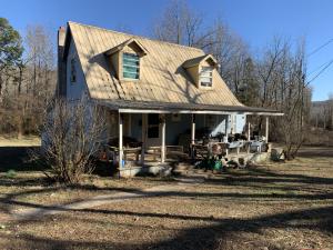 Country setting on 18.83 AC M/L with a creek running thru the property on a dead end road. Large barn and extra storage sheds. Great propertyto have your animals and garden. Priced to sell and wont last long!