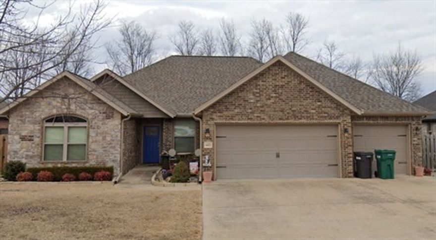 Welcome to this well-maintained 4-bedroom, 2-bathroom home located in the desirable Meadow Oaks subdivision of Rogers. Built in 2014, this home offers an open floor plan with spacious living areas, a cozy gas fireplace, and a large kitchen featuring granite countertops and stainless steel appliances. The primary suite includes a walk-in closet and double vanities. Enjoy the convenience of a 3-car garage and a fenced backyard with a covered patio—perfect for outdoor relaxation. Located just minutes from shopping, dining, and schools, with easy access to I-49 and Pinnacle Hills area. Lawn care is tenant's responsibility.