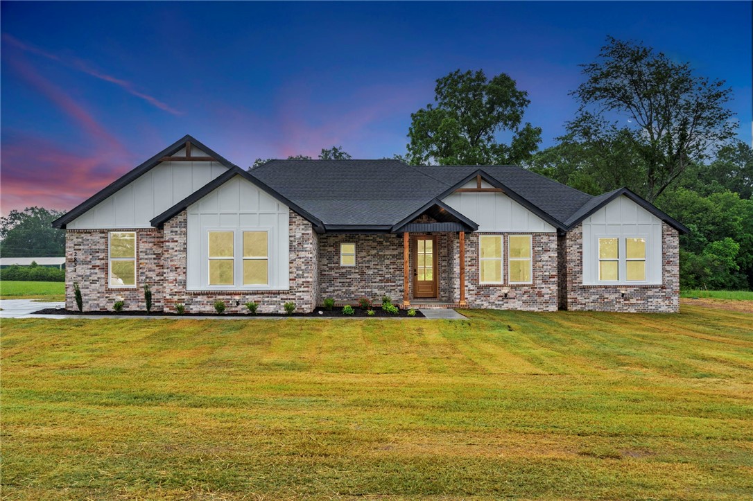 This 2,400 sq ft, 4 bed 3 bath home sits on almost 2 acres. Its hard to beat the feeling of country living while only being 5 min from Walmart, Aldi's, 7Brew, Starbucks and the City of Siloam Springs Kayak Park. This custom built Contemporary Craftsman home was designed with special attention to detail. Walking into this home you are greeted with a grand living area vaulted ceilings and a spacious kitchen with a walk-in pantry. The split floor plan allows for an easy flow throughout the home, the primary bedroom has access to the laundry room from the closet. A jack and jill allows for a designated 3rd full bath for guests. Make your way onto the back porch overlooking the spacious backyard with endless possibilities. Not to mention the short 15 min drive to the Woka Whitewater Park in Oklahoma. A prime location with access to local restaurants and small businesses in the heart of Siloam Springs this home checks all the boxes. Being outside city limits allows for additional customizations for its future homeowners!