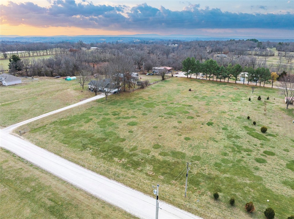Beautiful 2+ acre lot. Water, sewer available at street. Electric onsite. Septic design available.