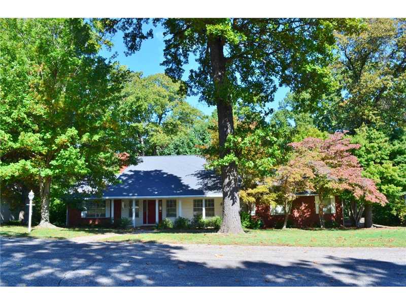 FREE WOODED VIEW! QUIET CUL-DE-SAC AT EDGE OF ROGERS, CLOSE TO BEAVER LAKE & DOWNTOWN. 12X20 ENCLOSED SUNROOM & 12X21 H/C ROOM W/BUILT-INS OFF OF THE GARAGE WOULD MAKE EXCELLENT MAN CAVE, EXERCISE, HOBBY OR GAME ROOM. GARAGE ALSO INCLUDES WORKSHOP AREA.,HOME FEATURES MASTER SUITE ON MAIN LEVEL, FORMAL DINING, OPEN LIVING & KITCHEN AREA AS WELL AS BREAKFAST NOOK. OFF OF LIVING RM IS SUNROOM W/DOUBLE SLIDING DOORS TO DECK AREA. UPSTAIRS FEATURES 2 BDRMS, FB & ANOTHER BONUS ROOM-WOULD MAKE A GREAT PLAY ROOM