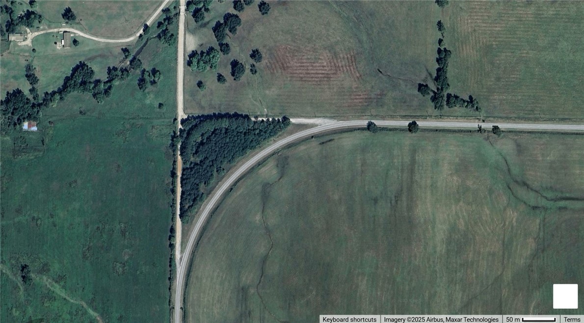 4+/- acres west of Gravette. Many options for property; Development potential. High visibility road frontage.
