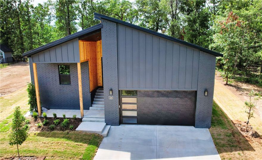 Seller to credit buyers $5000 towards closing costs, prepaids, interest rate buydowns or lender allowed fees. Smart design meets everyday comfort in this bright, welcoming new construction. Tucked into the natural beauty of Bella Vista, this home offers an open-concept layout & modern finishes—a perfect blend of style, livability & energy efficiency. Features include: statement exterior natural wood entryway (car siding), kitchen w/ granite island, eat-in nook, Stainless Steel appliances, walk-in pantry & LVP flooring. Beautiful lighting throughout.   Spacious walk-in closet, dedicated laundry & recirculating hot water heater. Covered back porch w/ level backyard—great for entertaining or relaxing. Bonus: 2-YEAR Builders Home Warranty. Conveniently near Loch Lomond, boat launch off Stoneykirk Dr & Branchwood Rec Center.