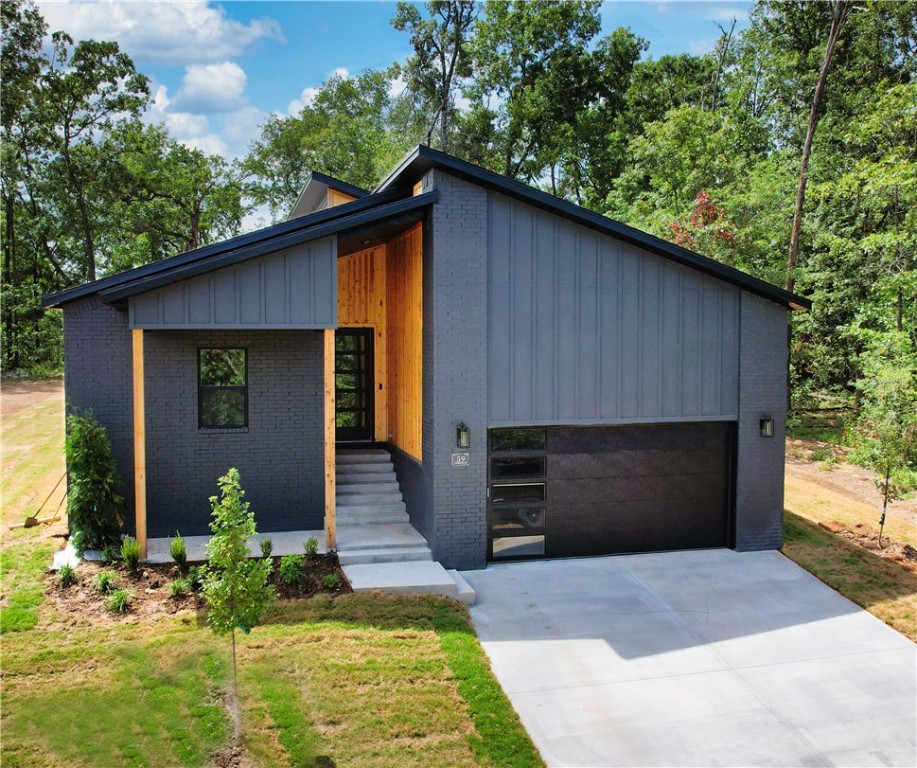 Smart design meets everyday comfort in this bright, welcoming new construction. Tucked into the natural beauty of Bella Vista, this home offers an open-concept layout & modern finishesāa perfect blend of style, livability & energy efficiency. Features include: statement exterior natural wood entryway (car siding), kitchen w/ granite island, eat-in nook, Stainless Steel appliances, walk-in pantry & LVP flooring. Beautiful lighting throughout. Spacious walk-in closet, dedicated laundry & recirculating hot water heater. Covered back porch w/ level backyardāgreat for entertaining or relaxing. Bonus: 2-YEAR Builders Home Warranty. Conveniently near Loch Lomond, boat launch off Stoneykirk Dr & Branchwood Rec Center.