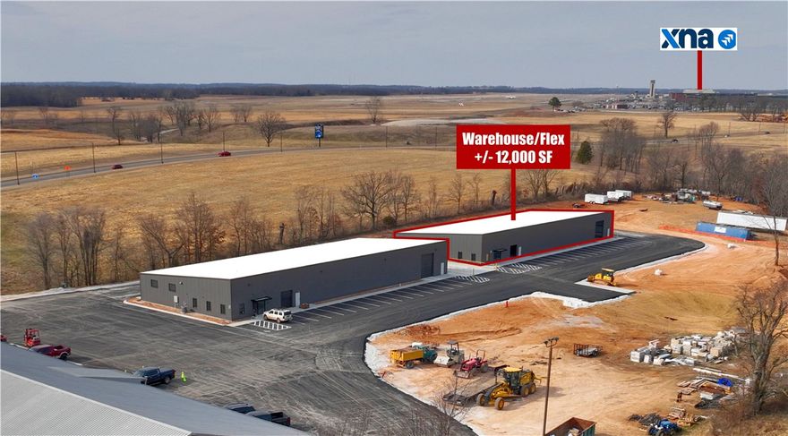 Position your business for success in this brand-new +/- 12,000 SF warehouse/flex building ideally
located just off Highway 264, directly in front of XNA. Custom build for offices is available with a 4 week turnaround for qualified tenant. The warehouse offers excellent accessibility and operational efficiency with two drive-in doors, plus access to a shared loading bay with a dock high door, ideal for distribution, light manufacturing, or flex users. Strategically positioned just 8.5 miles to the I-49 interchange, approx. 20 minutes to J.B. Hunt HQ, and approx. 25 minutes to Walmart's New HQ Campus. This property is an exceptional opportunity for logistics, service, or growth-oriented businesses.