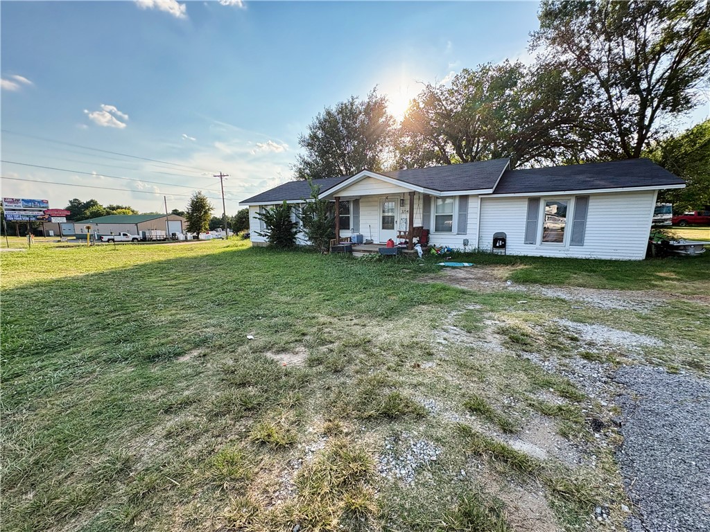 Incredible investment opportunity! This prime corner lot with mixed-use zoning offers endless potential—ideal for a business, residential home, or a combination of both. Located within Prairie Grove city limits, bordering Farmington, this property sits in a rapidly growing area with strong commercial development nearby. If you would like to tour the property please call! Property will be sold AS-IS, but inspections are welcome. Updated photos will be provided soon. Don’t miss your chance to secure a versatile property in a high-demand location! Also listed as MLS#1317555