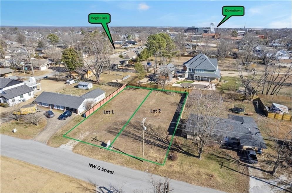 Large Bentonville Downtown Residential Building Lot. Lot is only 4 Blocks of easy walking distance to the Bentonville Square. Near Bogel Park in a New Redeveloping Area. Zoned DN-1 for Single Family Home. All Utilities Present. Build your Dream Home and Live in the Most Active Community in Northwest Arkansas. New Businesses are Opening at a rapid pace. Dining, Shopping, Schools, Hospital are still the Best in the State. Access easement to rear of Lot allows for rear garages, attached or detached. (3 car). Lots are 51x147' each.