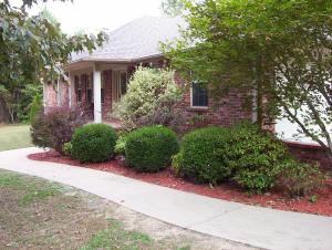 QUALITY CUSTOM BUILD - NEVER ON MARKET - WELL BUILT - TOTAL BRICK WITH VINYL TRIM -CUTTERS - FENCED BACK YARD - OUT BLDG - 3BR 2BA - 2 COVERED PORCHES - SIDEWALKS - ASPHALT DRIVE WITH CONCRETE APRON. VAULTED CEILINGS IN LIVING ROOM AND MASTER BR, ANY ITEMS IN HOME CAN BE PURCHASED - BUT DO NOT CONVEY.(THIS INCLUDES WASHER DRYER FRIG, WORK BENCH IN GARAGE) AND OTHER ITEMS.LP TANK IS RENTAL