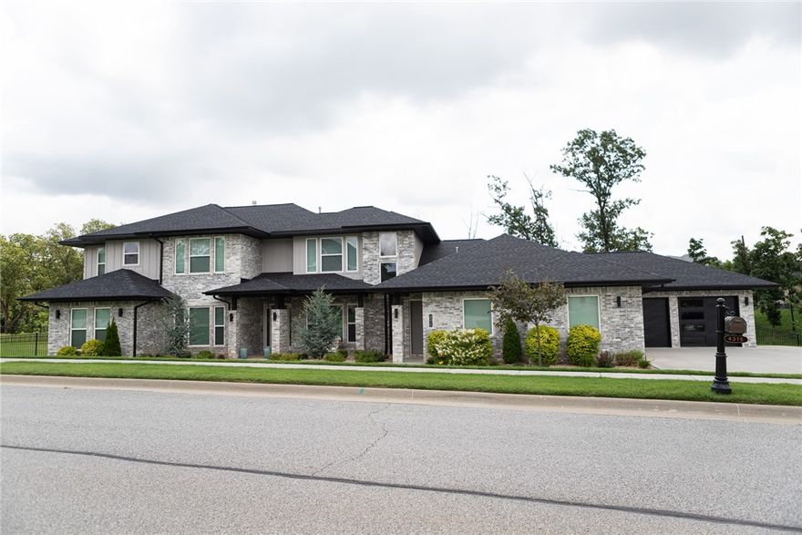 Estate modern style home in the highly sought after gated community of Scissortail.4 car garage, large bedrms each with walk-in closets & baths, 2 living areas both on the main level,perfect for entertaining w/ access to the deck & loft/bonus upstairs. Large open floorplan with TONS of natural light and space to entertain! STUNNING contemporary kitchen with modern wood accents & designer selected features and finishes.Two dishwashers,upgraded GE Cafe appliances,double ovens, fridge,wine cooler,walk-in pantry & more.Soaring two story ceiling in the living w/ tiled fireplace,tons of windows & access to the back patio.Luxurious master bedrm w/ spa like master bath.Double vanities,soaking tub,large walk-in tile shower & massive walk-in master closet with built-ins & access to laundry rm.Study w/ french doors,formal dining & mother-in-law suite on main level.Large sliding glass doors leading to the covered patio area overlooking the massive, fully fenced lot w/ built-in grill/outdoor kitchen