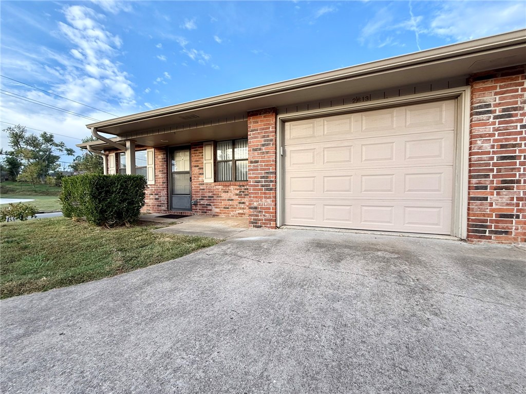 Newly remodeled Duplex in Rogers, Just minutes from restaurants, shopping etc. Living room has faux brick fire place with built in shelving, kitchen features dishwasher, glass top range, refrigerator and pantry. 2 large bedrooms, one has 2 large separate closets and the other has a walk in closet. Home has a Jack and Jill bathroom. Nice patio right off of the living room. 1 car garage, washer/dryer hookups. Lawncare is included.