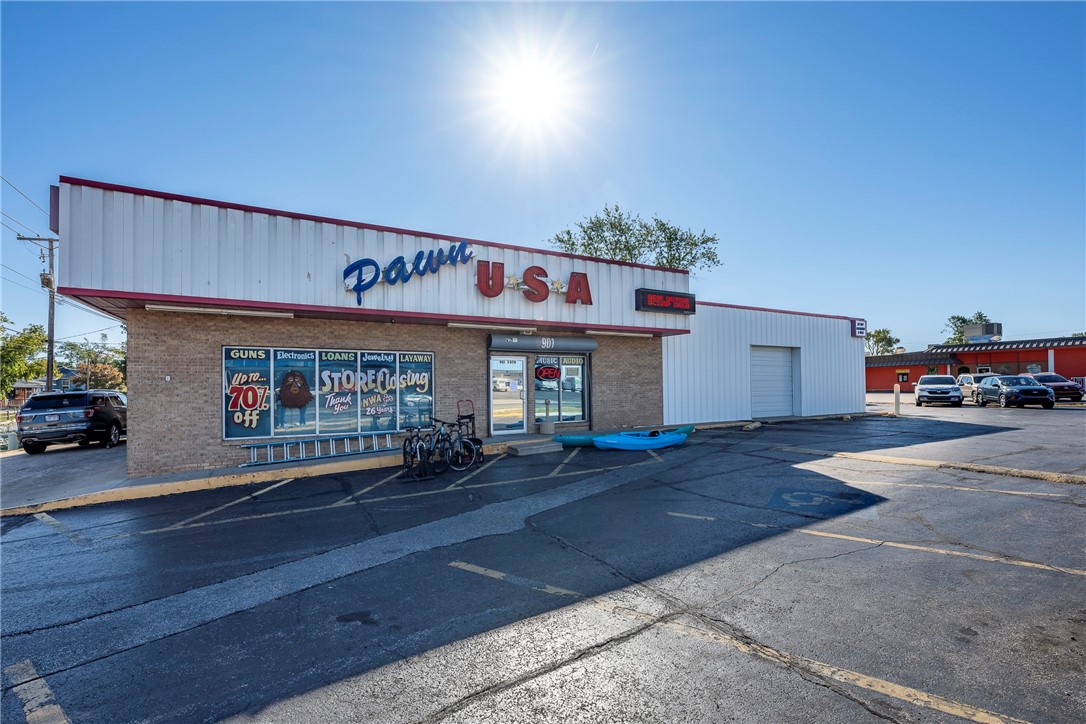This commercial property is located at a prime, high-visibility, signalized corner. It sits on approximately 0.42 acres along S 8th St, one of Rogers' busiest streets, with 150 feet of frontage on 71-Business and 123 feet on Oak St. The property boasts an impressive daily traffic count of about 25,000 vehicles. The building features a spacious retail area, an office space, and a backroom/shop area with a newly replaced roll-up door. Itās less than a 10-minute drive from Downtown Rogers, a Wal-Mart Supercenter, and the Rogers Entertainment District, making it an excellent location for businesses looking to benefit from the cityās rapid growth. The property comes with a new roof (2024) and an HVAC system replaced within the last five years. Currently owner-occupied, the owner and business will vacate, providing a unique opportunity to establish your own business in a thriving and expanding community.