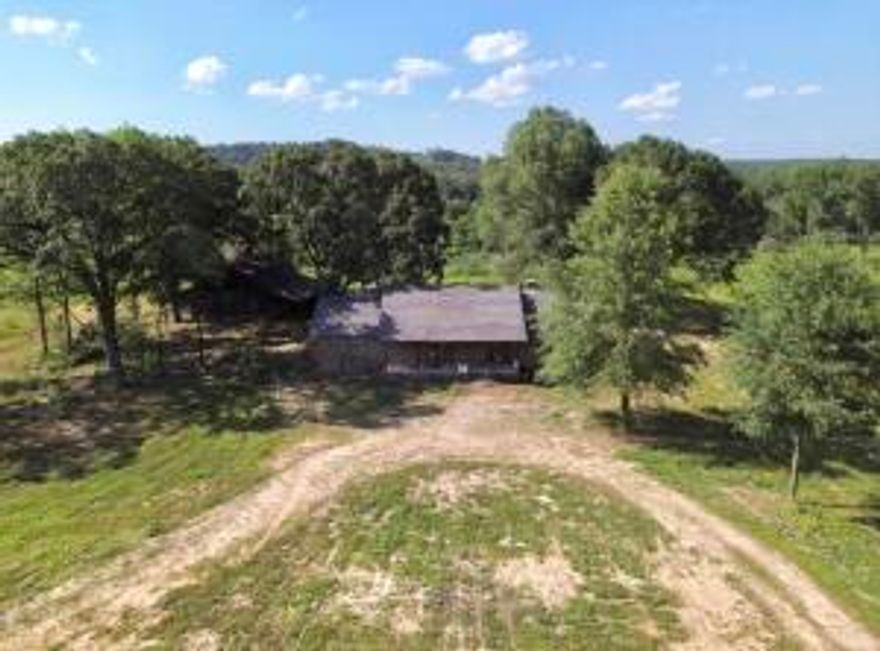 MUST SEE!!!  This rustic log home has all the character.  Sitting on 47+- acres of picturesque land, ideal for agricultural and rural living. This is your forever home. Every log and stone was gathered and milled on this property to create the perfect escape. No detail was left out.  This diverse tract offers a perfect blend of dense woodlands and open fields with multiple water sources for whitetail, spring turkey and small game.
