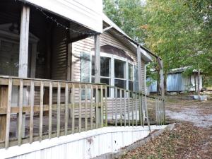 3BR 2BA doublewide mobile with deck on front and back; home is also handicap accessible.