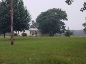 BEAUTIFUL COUNTRY HOME AND LAND. This 3 bedroom, 2 bath updated home is ready for your family to enjoy and the 20 (+/-) acres provides enough room to work and play.