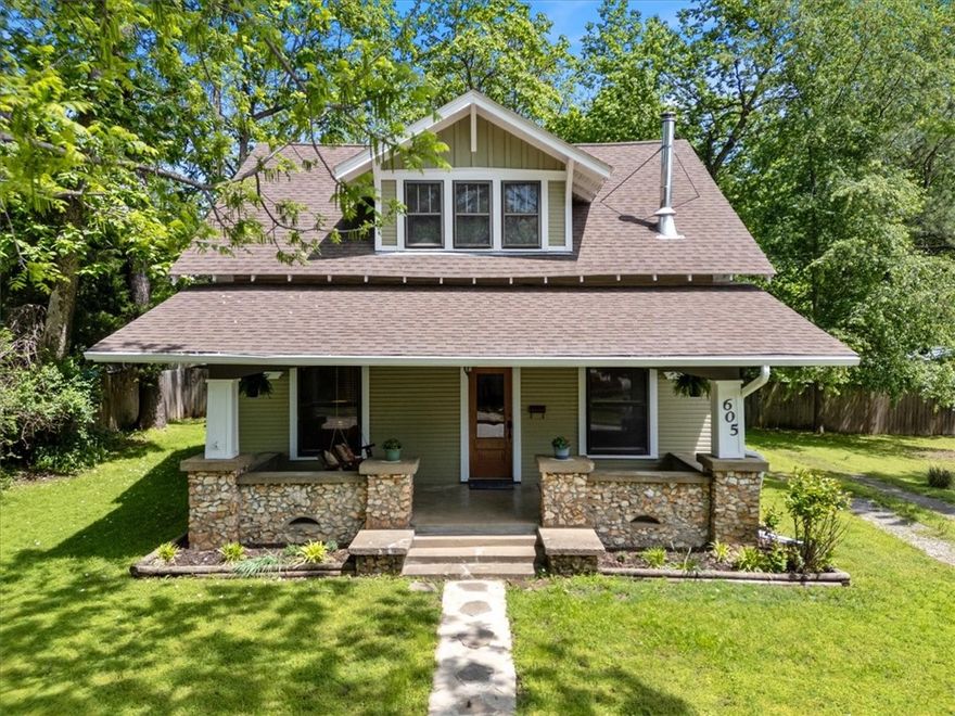 FULLY FURNISHED! Charming Historic Home in Prime Downtown Siloam Springs Location! Step into the charm of the early 1900s with this beautifully maintained historic home, ideally situated just three blocks from vibrant downtown Siloam Springs. Enjoy the convenience of being within walking distance to three scenic city parks, peaceful walking trails, coffee shops, & a variety of local restaurants. This home blends classic character with modern updates. Gorgeous original wood floors & tastefully renovated bathrooms; spacious utility room. Outdoor living is a dream with a large covered front porch, a screened-in back porch perfect for relaxing evenings, and a generous deck that leads to a garden area and privately fenced backyard. Additional features inc a detached garage/shop with ample workspace, a dedicated workroom, and mature landscaping that enhances the property’s curb appeal. ALL FURNISHINGS INCLUDED IN THE PRICE! IF FURNITURE IS NOT WANTED, SELLER WILL NEGOTIATE.
