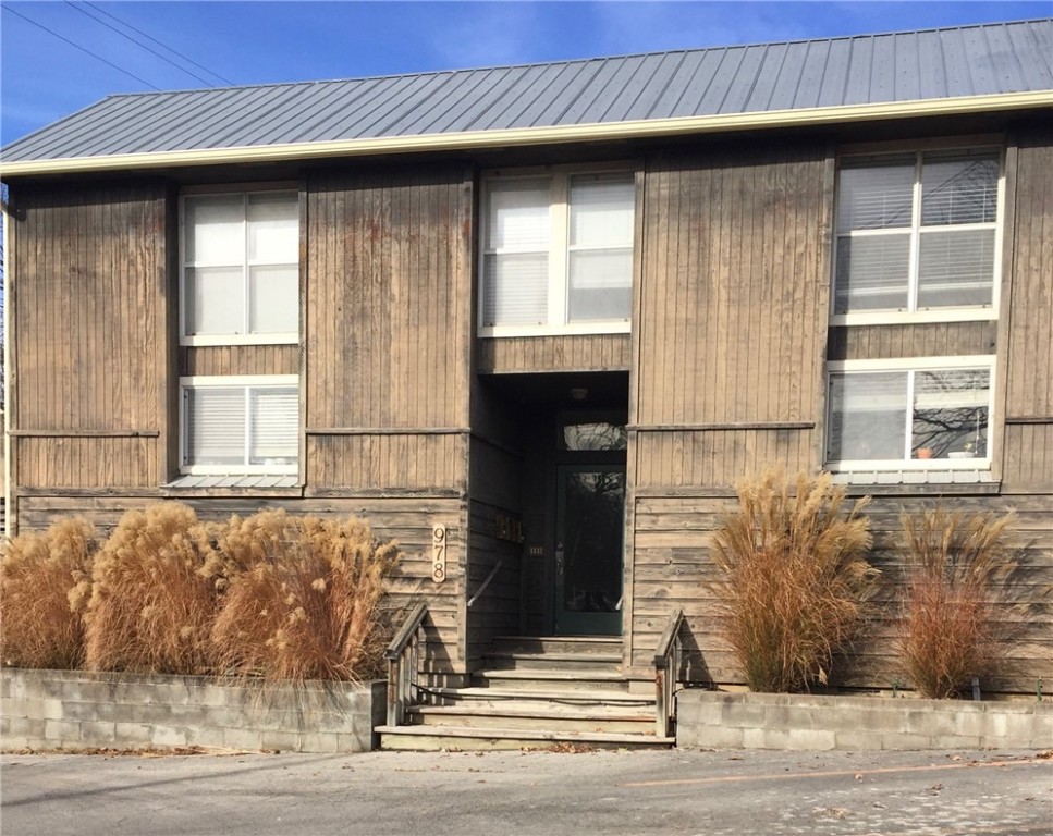 Charming 1-bedroom apartment, walking distance to Wilson Park! Quiet four-plex centrally located with easy access to I-49 and College Ave. Open concept, with plenty of natural light. Living room has beautiful hardwood floors. Porch off living room with gardening space. Bedroom upstairs has tall, vaulted ceilings. Freshly painted & refreshed throughout! Parking lot directly in front, One parking space included. Tenant responsible for utilities. Cats welcome with an additional deposit & rent, but sorry no dogs. Don't miss out on this location!