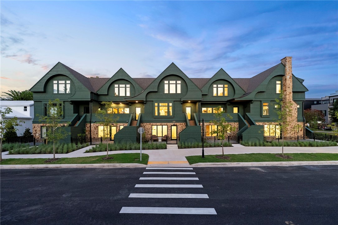 Welcome to Orchard Trailside, Bentonvilleās most esteemed luxury townhome community. An urbanistās hub in the thriving downtown scene, the property features a fresh and modern reimagining of the Craftsman Revival style. Features incredible amenities, including a whole home water filtration system, air quality scrubber, luxurious finishes, and a versatile mother-in-law suite. Enjoy smart home convenience with controlled cameras, locks, and more, making everyday living both comfortable and modern! This upscale nine-unit enclave blends solid, high-quality architectural features and natural elements with intentionally curated, sleek finishes. Living is easy here with immediate, out the-door access to the Downtown Trail and the nearby Razorback Greenway. Units feature a simple yet refined aesthetic that exudes character, warmth, functionality, and a distinct urban-meets-artisan vibe.