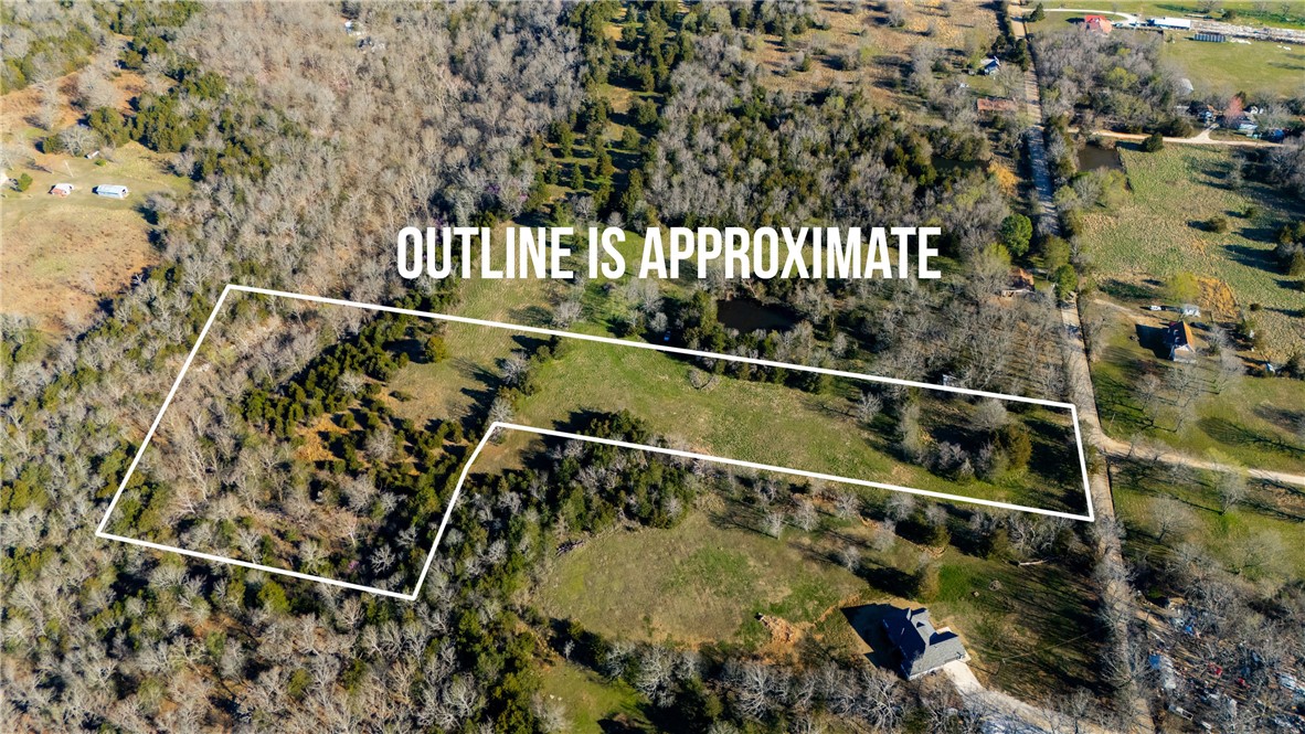 This 9.04-acre property offers the perfect blend of peaceful countryside living and convenience. Located in the countryside of Prairie Grove, this land is just 2 miles from the heart of town and only about 15 minutes to Fayetteville. With water and electricity readily available, you can start your project without delay. The property is mostly cleared, making it an ideal location to build your dream home. Towards the back of the property, a charming creek runs through, adding a tranquil, natural element to the landscapeāperfect for relaxing by the water or enjoying the peaceful sounds of nature. No covenants or restrictions, giving you the freedom to design and use the property as you see fit. Whether youāre looking for a private country retreat, a place to build your forever home, or room for additional structures, the possibilities are endless. Survey available.